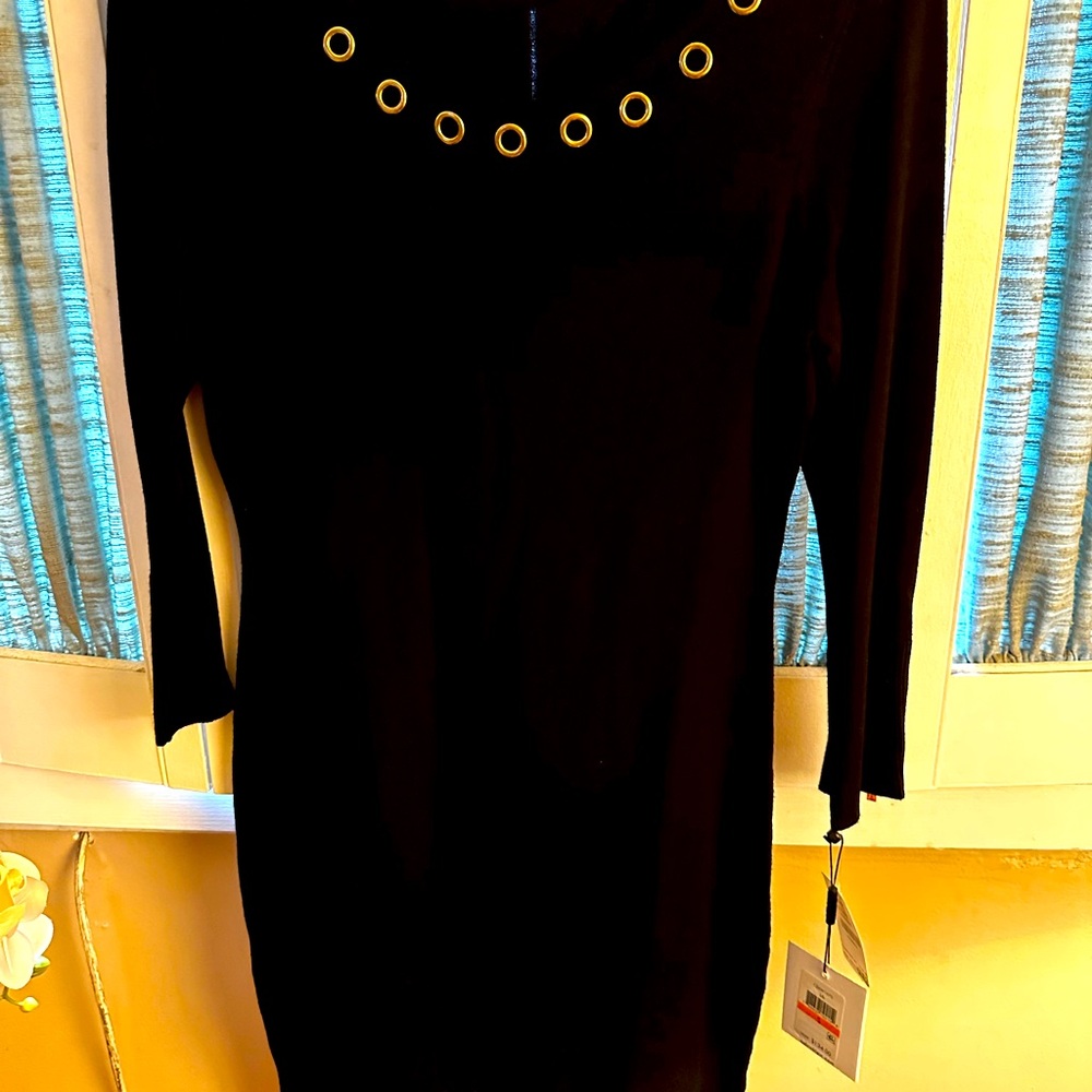 Brand New Calvin Klein sweater dress.  Beautiful addition  for fall weather